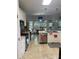 Functional kitchen that flows into the breakfast nook, offering an eat-in space and backyard views at 1713 Arbor Way, Albemarle, NC 28001