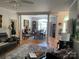 Spacious living room with hardwood floors, elegant columns, and comfortable seating at 1713 Arbor Way, Albemarle, NC 28001