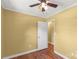 Bedroom featuring hardwood floors, ceiling fan, and closet at 203 Nottingham Dr, York, SC 29745