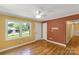 Bedroom with hardwood floors, a ceiling fan and natural light from a large window at 203 Nottingham Dr, York, SC 29745