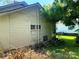 View of the back exterior of home with siding, window, door, and small step at 213 Maple St, Rock Hill, SC 29730