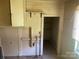 An interior shot of a room with wooden walls and view to closet at 213 Maple St, Rock Hill, SC 29730