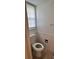 Bathroom with a standard toilet and window at 2216 Helen Dr, Gastonia, NC 28054