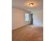 Bedroom with carpet and a large window at 2216 Helen Dr, Gastonia, NC 28054