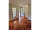 Inviting living room with gleaming hardwood floors, perfect for relaxing or entertaining guests at 2216 Helen Dr, Gastonia, NC 28054