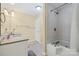 Bathroom offers dual vanity sinks, large mirror and tub with shower at 229 Campsite Rd, Rock Hill, SC 29732