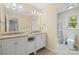 Well-lit bathroom boasts double sinks, spacious vanity, and a separate shower room at 229 Campsite Rd, Rock Hill, SC 29732