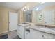 Bathroom boasts dual vanities, neutral countertops and tile floor at 229 Campsite Rd, Rock Hill, SC 29732