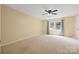 Bedroom offers carpet floor, ceiling fan, and large window at 229 Campsite Rd, Rock Hill, SC 29732