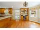 Charming eat-in kitchen boasts hardwood floors and natural wood cabinetry at 229 Campsite Rd, Rock Hill, SC 29732