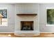 The living room features a painted brick fireplace with a wooden mantel at 229 Campsite Rd, Rock Hill, SC 29732