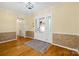 Inviting foyer with decorative front door, beautiful hardwood floors, and neutral paint palette at 229 Campsite Rd, Rock Hill, SC 29732