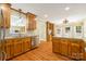 This eat-in kitchen features natural wood cabinets and stainless steel appliances at 229 Campsite Rd, Rock Hill, SC 29732