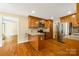 Cozy kitchen with wood cabinets and stainless steel refrigerator at 229 Campsite Rd, Rock Hill, SC 29732