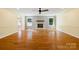 Large living room featuring hardwood floors and a cozy fireplace, perfect for entertaining at 229 Campsite Rd, Rock Hill, SC 29732