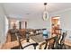 Open concept dining room offering hardwood floors and easy access to living room and kitchen at 251 Gleneagles E Rd, Statesville, NC 28625