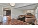 Spacious living room featuring a step-up to the formal dining room and hardwood flooring at 251 Gleneagles E Rd, Statesville, NC 28625