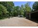 A large barn with adjacent sheds on a dirt lot at 265 St Matthews Church Rd, Salisbury, NC 28146