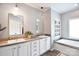 Bathroom with double sinks, and a soaking tub at 265 St Matthews Church Rd, Salisbury, NC 28146
