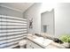 Modern bathroom with stylish shower curtain, wood look counter top and decorative accessories at 265 St Matthews Church Rd, Salisbury, NC 28146