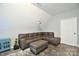 Bonus room with comfortable seating and projector setup perfect for entertainment at 265 St Matthews Church Rd, Salisbury, NC 28146