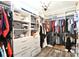 Well-organized walk-in closet with shelves, drawers, and hanging space offers ample storage at 265 St Matthews Church Rd, Salisbury, NC 28146