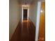 Hallway with wood flooring and view of Kitchen at 2815 Highland Dr, Lincolnton, NC 28092