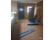 Spacious living room with a chair and an exterior door at 2815 Highland Dr, Lincolnton, NC 28092