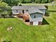 Aerial view of the home featuring an outdoor deck and fenced in yard at 329 W Red Cross Rd, Oakboro, NC 28129