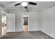 Bedroom with neutral walls showing entry to ensuite bathroom at 329 W Red Cross Rd, Oakboro, NC 28129