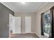 Neutral bedroom featuring plush carpet, fresh paint, a window and ample closet space at 329 W Red Cross Rd, Oakboro, NC 28129