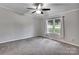 Neutral bedroom featuring a ceiling fan and a window for natural light at 329 W Red Cross Rd, Oakboro, NC 28129