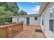 The wooden deck is perfect for outdoor entertaining and enjoying the fresh air at 329 W Red Cross Rd, Oakboro, NC 28129
