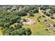 Large lot featuring a metal building with additional structures, encircled by mature trees and greenery at 3724 County Home Rd, Conover, NC 28613