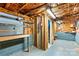 Unfinished basement with exposed wood framing, utility hookups, and a concrete floor at 3724 County Home Rd, Conover, NC 28613