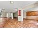Spacious basement with vinyl flooring, neutral walls, and painted structural beams at 3724 County Home Rd, Conover, NC 28613