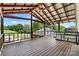 Outdoor deck with grill and beautiful view of the yard and surrounding greenery at 3724 County Home Rd, Conover, NC 28613