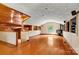 Open living area featuring hardwood floors, a fireplace, and natural light at 3724 County Home Rd, Conover, NC 28613