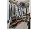 Walk-in closet with custom shelving and ample space for clothing and storage at 3906 Brickfield St, Hickory, NC 28602