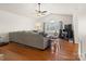 Bright living room features hardwood floors, vaulted ceiling, large sectional sofa and natural light at 3906 Brickfield St, Hickory, NC 28602