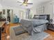 Bright main bedroom with ensuite bath, a large king bed and neutral decor at 3906 Brickfield St, Hickory, NC 28602