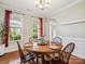 Traditional dining room features a hardwood floor and classic wainscotting at 4090 Sunset Dr, Rock Hill, SC 29732