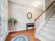Bright foyer featuring hardwood floors, staircase, and elegant decor at 4090 Sunset Dr, Rock Hill, SC 29732
