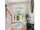 Bright foyer featuring hardwood floors, staircase, and elegant decor at 4090 Sunset Dr, Rock Hill, SC 29732