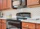 Well-equipped kitchen featuring granite countertops and modern stainless steel appliances at 4090 Sunset Dr, Rock Hill, SC 29732