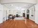Inviting living room with hardwood floors, a ceiling fan, and a cozy fireplace at 4090 Sunset Dr, Rock Hill, SC 29732