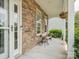 Cozy front porch offers stone accents, space to relax, and a welcoming entrance at 4090 Sunset Dr, Rock Hill, SC 29732