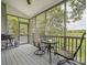 Inviting screened porch with outdoor seating, perfect for enjoying the peaceful views and outdoor relaxation at 4090 Sunset Dr, Rock Hill, SC 29732