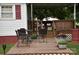 Cozy back deck setup with outdoor seating, perfect for relaxing and entertaining at 4143 E Maiden Rd, Maiden, NC 28650