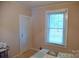 Comfortable bedroom featuring a window for ample natural light and a closet for storage at 4143 E Maiden Rd, Maiden, NC 28650